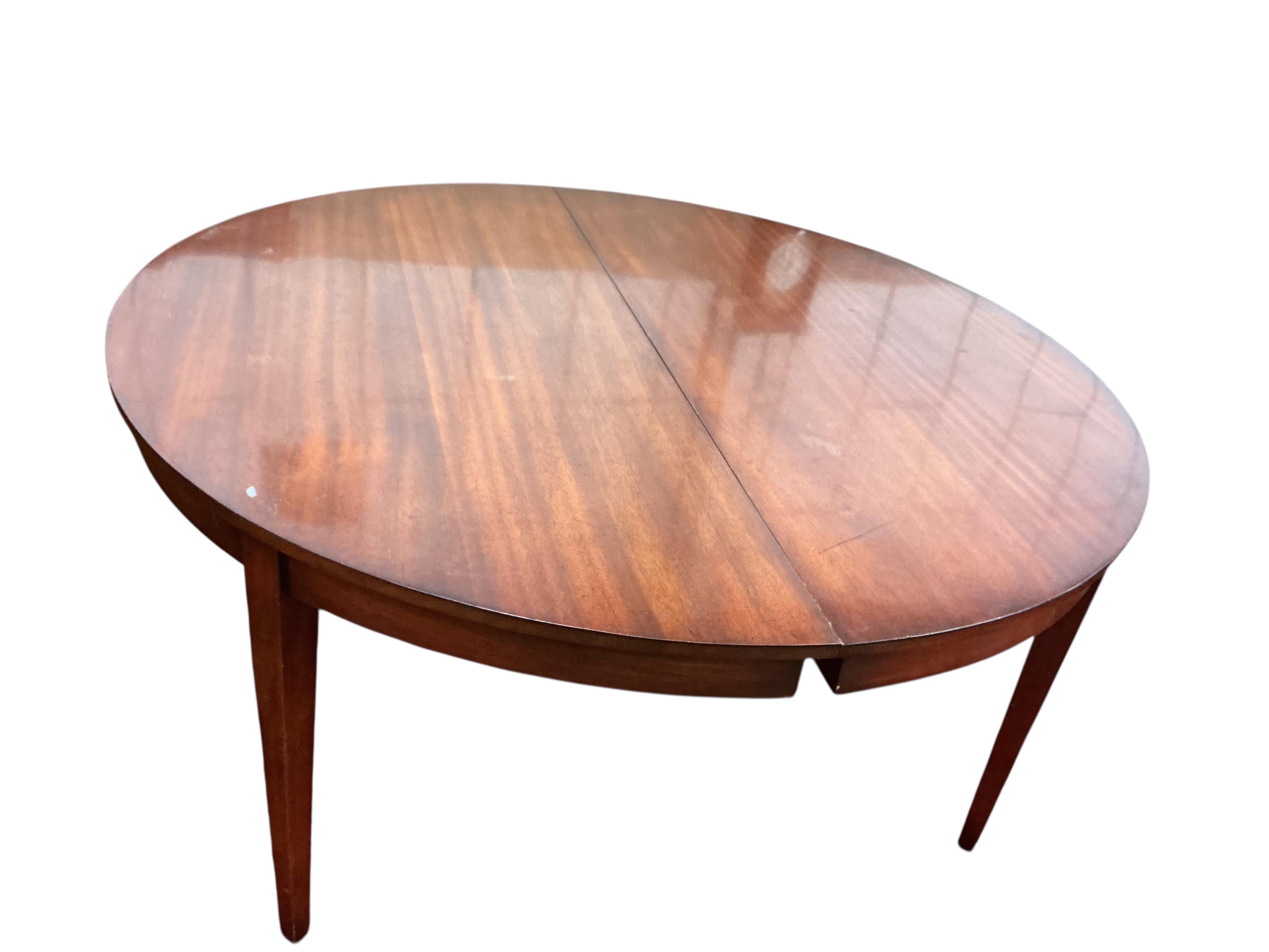 A reproduction George III style mahogany D end dining table, width 305cm extended, depth 145cm, height 74cm
